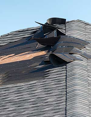 Wind damaging Roof